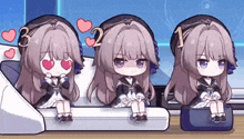 three little girls are sitting next to each other on a couch .