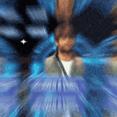 a blurry picture of a man with a white star in the middle
