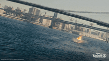 a poster for fantastic four shows a bridge over a river