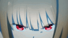 a close up of a girl with red eyes