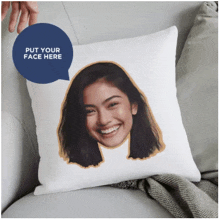 a pillow with a picture of a woman 's face on it