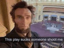 a man with a beard is taking a selfie with the caption this play sucks someone shoot me