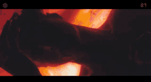 a man without a shirt is laying on his back in a red and orange painting