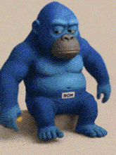 a blue gorilla with ron written on his shorts
