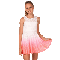 a young girl wearing a white and pink dress