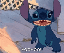 a cartoon character from lilo and stitch is standing on a wooden floor and smiling .