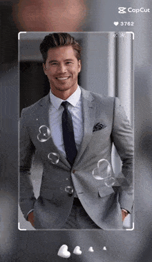 a picture of a man in a suit and tie with bubbles coming out of it