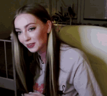 a woman with long hair is wearing a t-shirt that says " i love you "