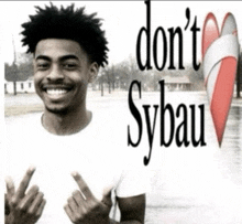 a man in a white shirt with the words " do n't sybau " on the front