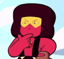 a close up of a cartoon character with a red and yellow face .