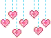 a bunch of pink hearts hanging from strings on a white background