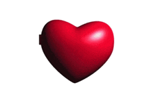 a heart shaped mirror has a picture of a young man in it