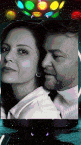 a black and white photo of a man and a woman