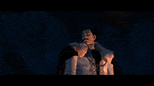 a man in a red coat is standing in a circle of fire