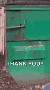 a raccoon is sticking its head out of a green trash can and saying `` thank you '' .