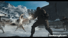 a group of soldiers are fighting a naked woman in the snow with make a gif.com in the corner