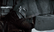 a man wearing a helmet with a letter u on it