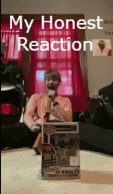 a man singing into a microphone with the words my honest reaction
