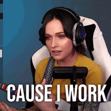 a woman wearing headphones says " cause i work " while sitting in a chair