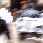 a blurry photo of a group of people sitting at a table