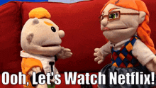 a couple of stuffed animals sitting on a red couch with the words ooh let 's watch netflix