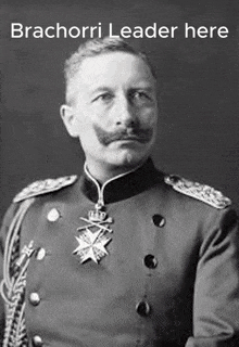 a black and white photo of a man in a military uniform with the words brachorri leader here below him .