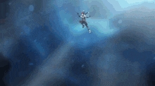 a person is flying through the air in a blue sky