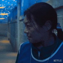 a woman in a netflix advertisement says you idiot