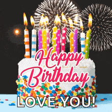 a birthday cake with candles and fireworks and the words `` happy birthday love you '' .