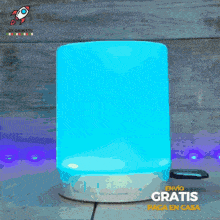 an advertisement for los gadget12 shows a light being turned on