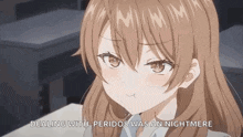 a girl with brown hair is sitting at a desk in a classroom and making a face .