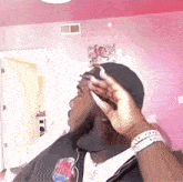 a man wearing a black hat and a shirt that says ' chicago bulls '