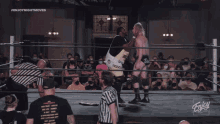 a wrestling match is being shown on the enjoy night moves channel