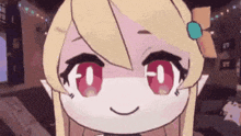 a close up of a cartoon girl 's face with red eyes and blonde hair .