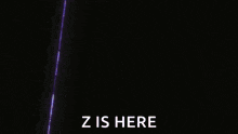 a purple light is coming out of a dark room .