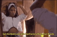 a woman is looking at herself in a mirror with the words get the bold look with hair factory black hair braids