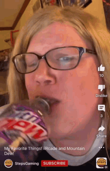 a woman drinking a bottle of mountain dew from stepsgaming