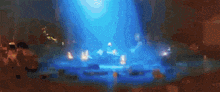 a blurry picture of a stage with a blue light shining on it