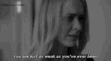 a woman says you are just as weak as you 've ever been in a black and white photo