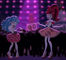 two monster high girls are dancing in front of a crowd of people