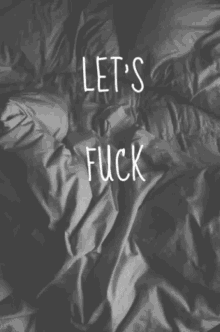 a bed with the words let 's cuddle written on it