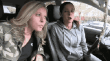 two pretty women disoriented women in car