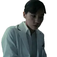 a woman in a white lab coat is looking down at something