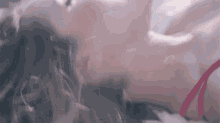 a woman in a red bra is laying down