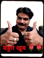 a man giving a thumbs up in front of a sign that says " bahut shubh "