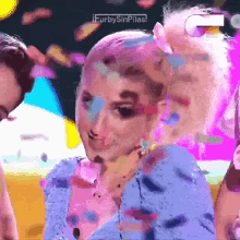 a blurry picture of a woman with the words furbysinpilas on the bottom right