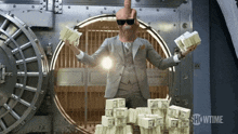 a man in a suit is holding stacks of money in a bank vault that says showtime
