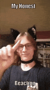 a young man wearing cat ears and glasses with the words my honest reaction