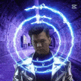 a man in a silver jacket stands in a tunnel with a blue lightning circle around him