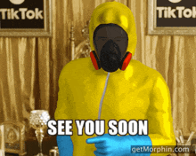a man in a yellow hazmat suit is pointing to the word see you soon